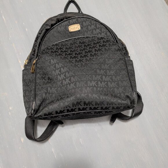 Michael Kors Handbags - Michael Kors Black Monogram Backpack Gold Hardware MK Logo Abbey Medium